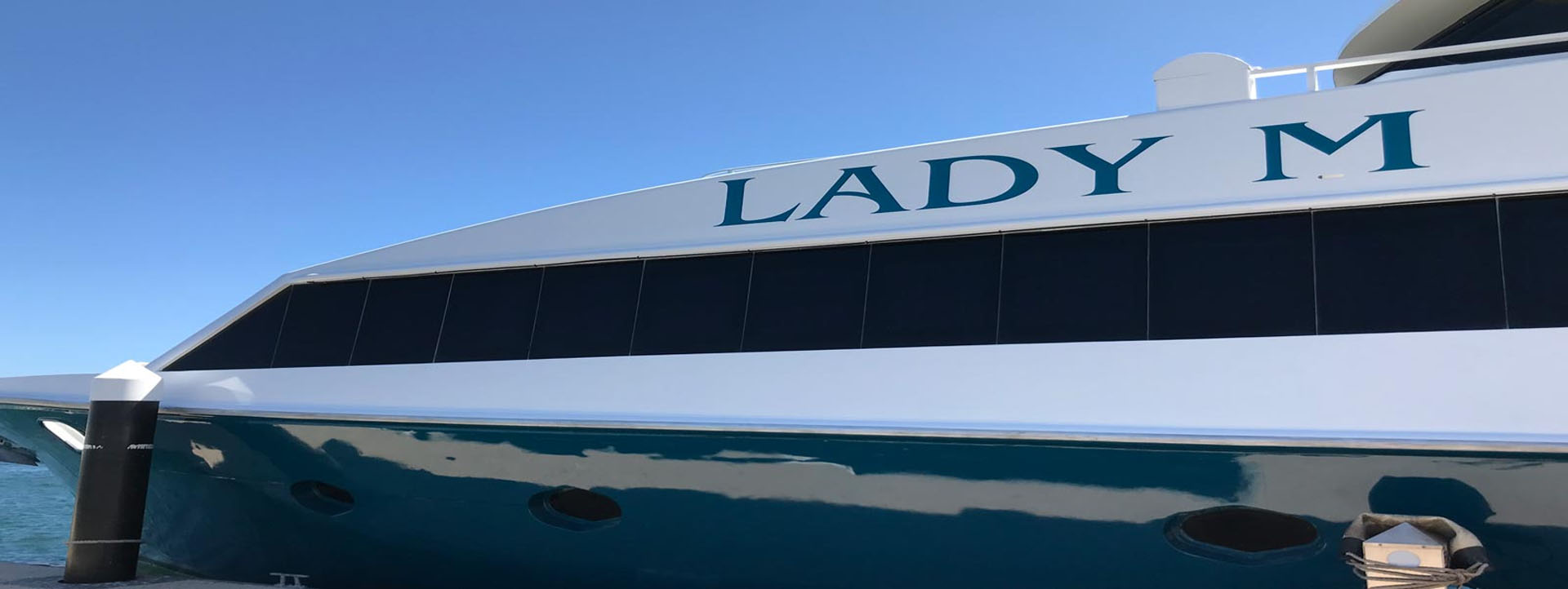 LADY M side logo of vessel