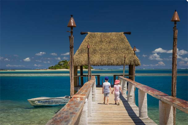 MALOLO-ISLAND-pier-kids-walk-and-hold-hands