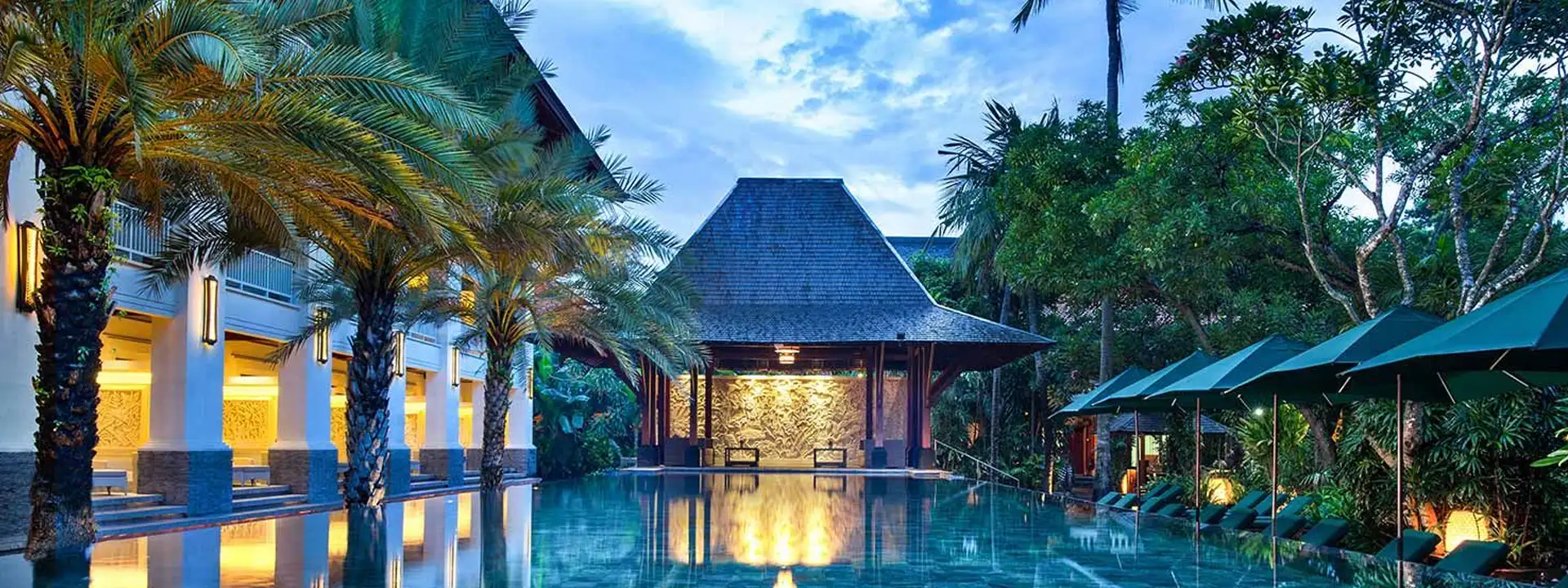 PURI-SANTRIAN-BALI-HOLIDAY-PACKAGEs-pool-deluxe-room-slider