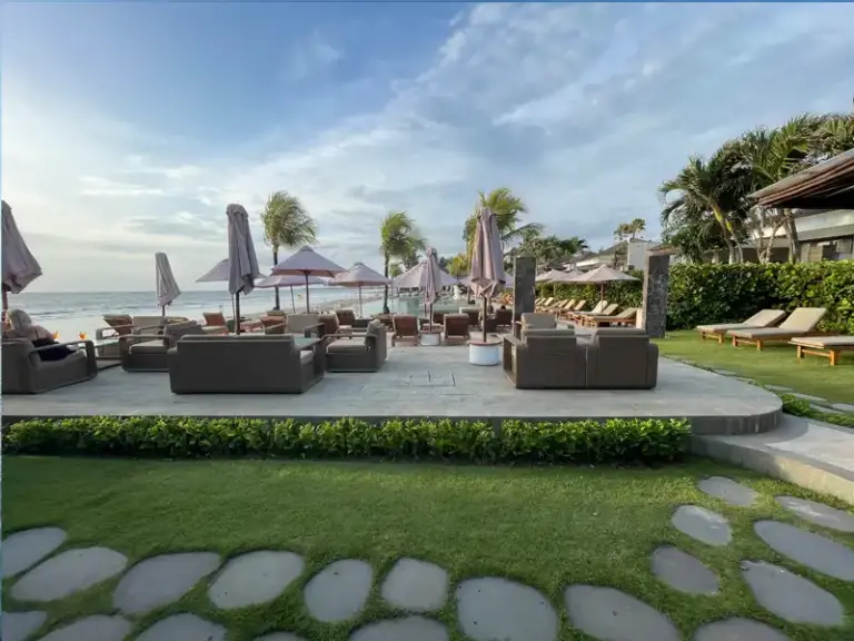 SEMINYAK BEACH RESORT HOTEL pool umbrellas ocean