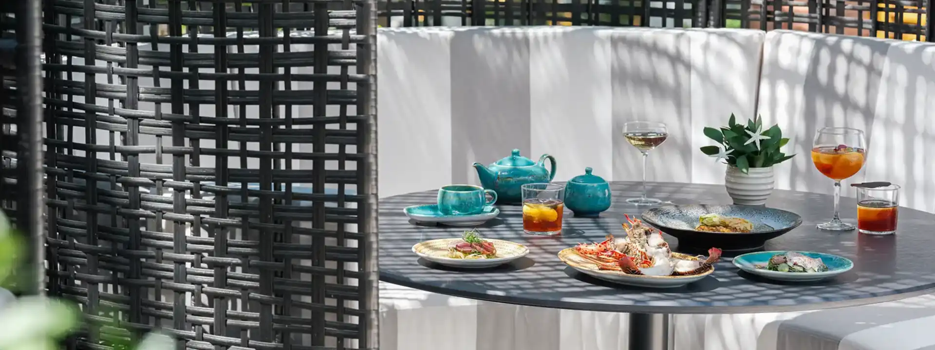 SKAI BAR & GRILL slider Padma Legian table with food