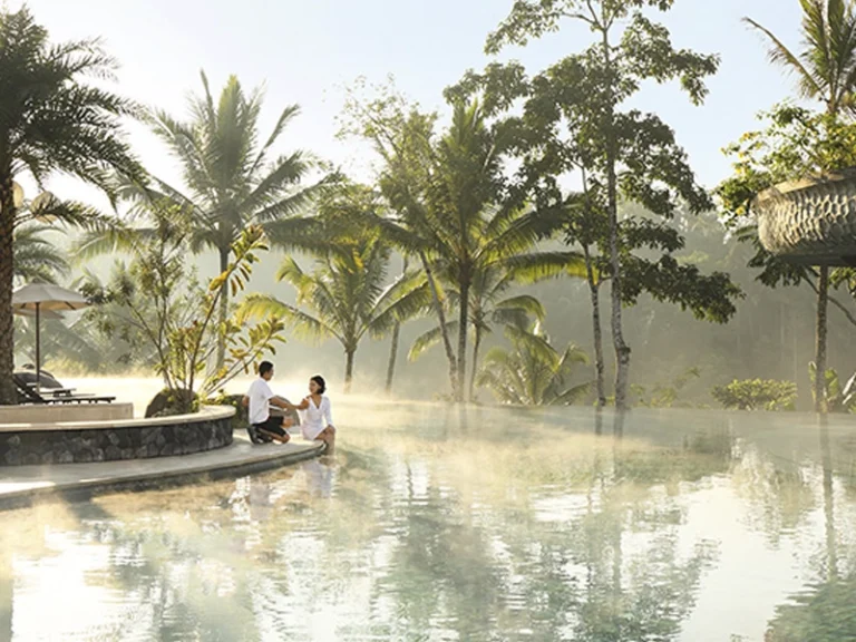 PADMA-UBUD-BALI-HOLIDAY-PACKAGE-couple-at-the-pool-image