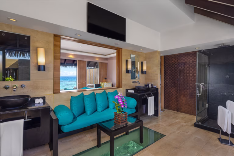 ADAARAN PRESTIGE VADOO MALDIVES overwater villa lounge glass floor