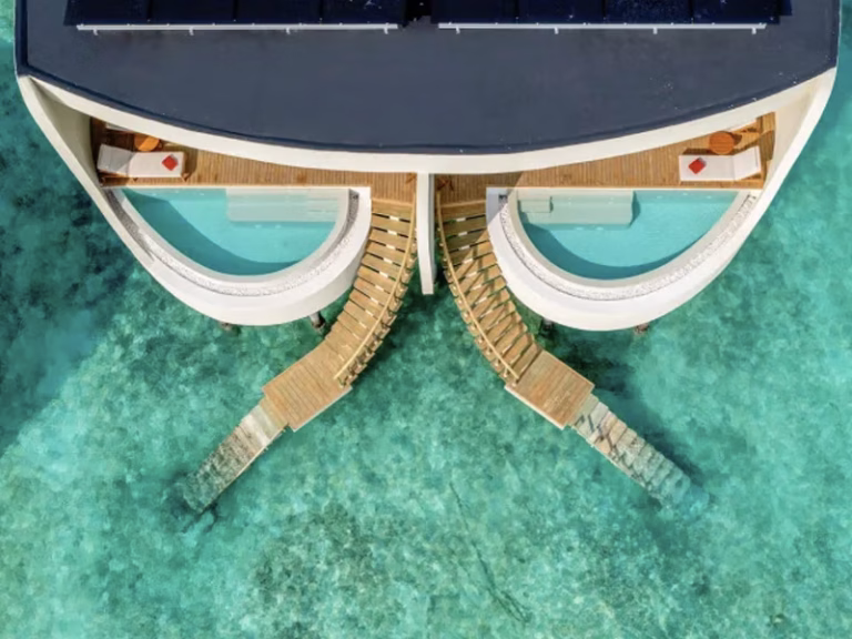 CENTARA GRAND LAGOON MALDIVES aerial views over water villas