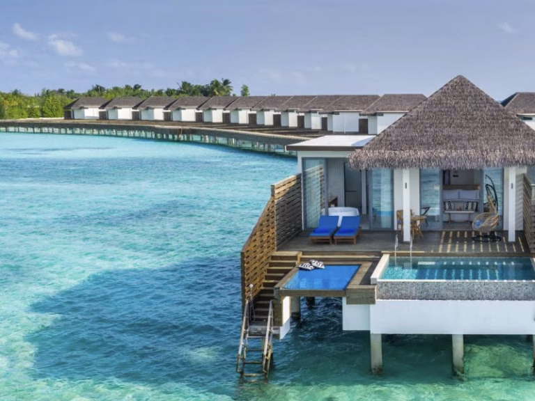 DusitD2 Feydhoo Maldives Overwater Pool Villa view to atoll behind