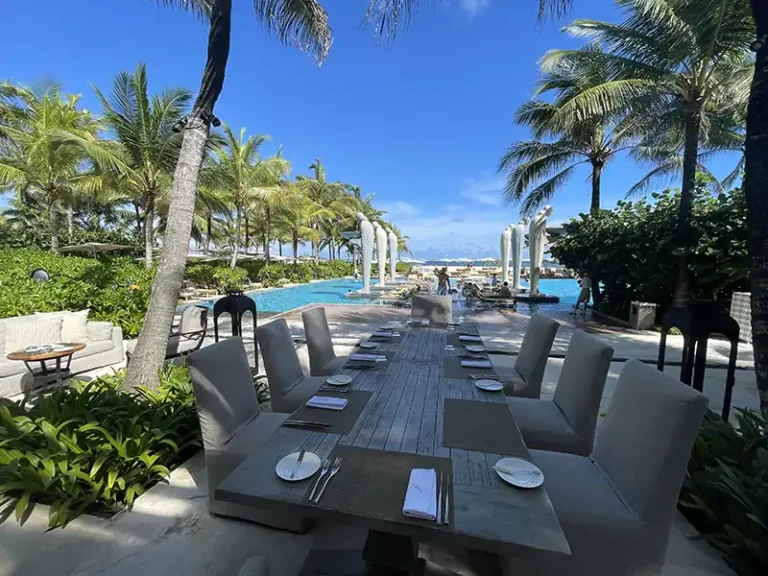 MULIA dining table and swimming pool al fresco setting